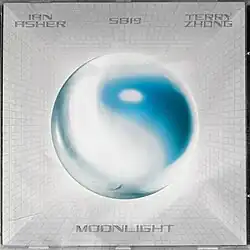 The cover art for "Moonlight":&nbsp;A gray sphere with white and blue highlights on top of a backdrop of a space with square pattern walls topped with white overlay. The song's title is written at the bottom part of the image, while the artists' names are at the top.