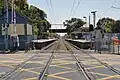 Northbound view of the former ground level station platforms viewed from the former Moreland Road level crossing, November 2019