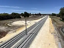 Double track railway viewed from a bridge