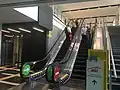 Escalators leading from Surian Link to the station.