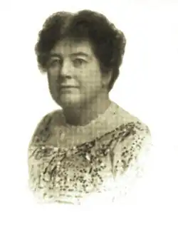 Black and white portrait photograph of a middle-aged white woman