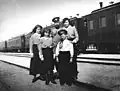 The OTMA sisters (Olga shooting) and the tsar in Pochtovoe train station, during a pause of the Russian imperial train, March 1914.