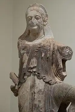 Marble akroterion of the goddess Nike from the Archaic temple. Delphi, Greece. Archaic, 515-505 B.C.E. Delphi Archaeological Museum, Delphi.