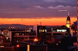 Apartments in North Melbourne. The clock tower of the North Melbourne Town Hall is on the far right.