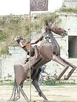 Cavalier with standard.