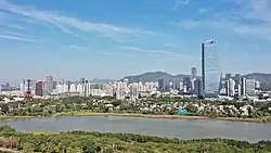 Overseas Chinese Town with OCT Tower on the right side in 2020.