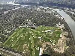 Aerial photograph of Oakmont with Oakmont Country Club at bottom