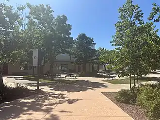 Part of the campus of Oakwood School, with a large building.