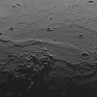 The prominent wrinkle ridge across the center is Schiaparelli Dorsum.