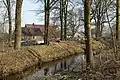 Farmhouse near a stream