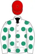 White, emerald green spots, red cap