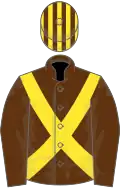 Brown, yellow cross-belts, striped cap