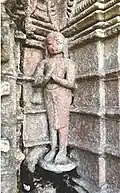 An idol of a Śvetāmbara monk wearing colpattā carved on the outer walls of a Jain temple at Pavagadh Hill