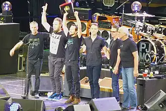 Pearl Jam in New York City in 2016. From left to right: Mike McCready, Jeff Ament, Eddie Vedder, Matt Cameron, Stone Gossard and session/touring musician Boom Gaspar.
