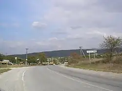 View of the road to Perevalivka with the Crimean Mountains in the background.
