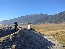 A buddhist stupa on the hiking trail in Phobjikha