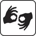 Stylized icon of two hands in the form of the "interpret" sign