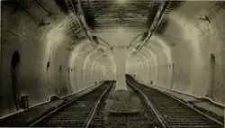 View through a two-track railway tunnel