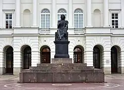 Front view with the Staszic Palace in the background.