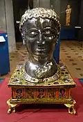 Head of pope Alexander; 1145; wood, silver, gilt bronze, gems, pearls and champlevé enamel; height: c. 45&nbsp;cm; Art & History Museum (Brussels, Belgium)[139]