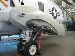 A helicopter pontoon that may be augmented by an inflatable emergency pontoon shown in black