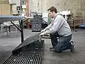 Use a portable work platform and adjust it to the height of the worker.