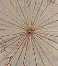 Early 32-wind compass rose, shown as a mere collection of color-coded rhumblines, from a Genoese nautical chart (c. 1325)