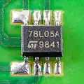 STMicroelectronics 78L05A in a SO-8 surface-mount package with larger solder pads on the left for wave soldering.