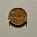 Penny stamped with "WORTHLESS".