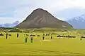 Tourists playing cricket in Chitral