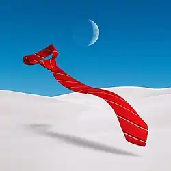 A blue background as the sky, with a waxing crescent moon is visible in the back. A part of the white long-sleeved shirt of the uniform from the group's originating telenovela appears over half the cover, with the red tie with blue and white lines floats on top.