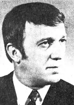 Black and white photo of Bernard in a suit