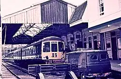 Rear oil lamp being placed on a Class 103 at Kingswear station