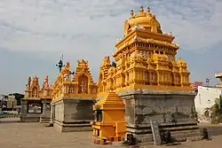 Ornate Dravidian style shikhara (superstructure over shrine) and sala roofs over mantapa walls in the Teru Malleshvara temple at Hiriyur