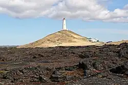 Reykjanesviti lighthouse on Bæjarfell with lighthouse keeper's residence
