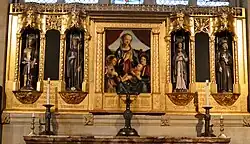 The statues in this reredos at St John the Divine, Richmond, London are by MacDonald Gill