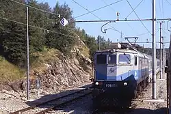 Retired class 1061 locomotive pulling an InterCity from Zagreb, 2004