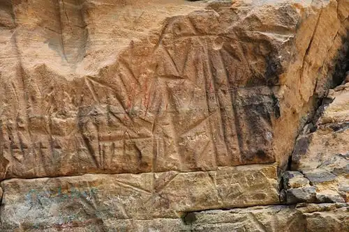 The Roche-A-Cri Petroglyphs. Vandalism from the 1800s are visible on the petroglyphs