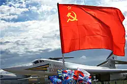 The Soviet flag along with an assortment of Russian and Soviet military flags