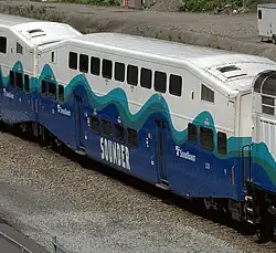 A double-decker passenger car in the Sounder livery