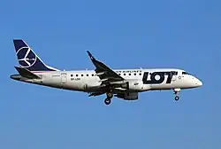 A LOT Embraer 170 in the current, post-2011 livery.