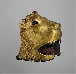 Barbuta sallet with decorative sheathing in the shape of a lion's head, Italian, 1475–1480, Metropolitan Museum of Art