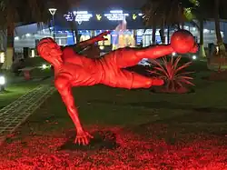 Statue of a player near the main gate of VYBK