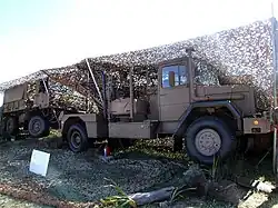 A display showing SAMIL 20 towed by SAMIL 50 recovery vehicle