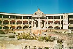 Photograph of the abandoned Santo Stefano prison