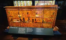 Rectangular sarcophagus with sloping lid and colourful decoration