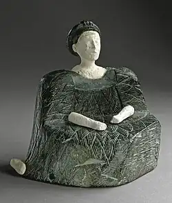 Female figurine of the "Bactrian princess" type; 2500–1500; chlorite (dress and headdress) and limestone (head, hands and a leg); height: 13.33&nbsp;cm; Los Angeles County Museum of Art (US)