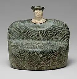 Seated figurine (Bactrian); 3rd-2nd millennia BC; chlorite and limestone; height: 9&nbsp;cm; Metropolitan Museum of Art (New York City)[82]