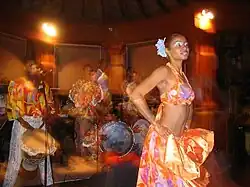 Sega performers, men and women wore colourful clothing, 2004.