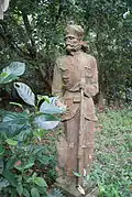 Artist unknown, Statue of Sikh guard, 1.83m (h), located at the tomb of Mr Wong Chin Yoke (d.1943), Bukit Brown Cemetery, Singapore.